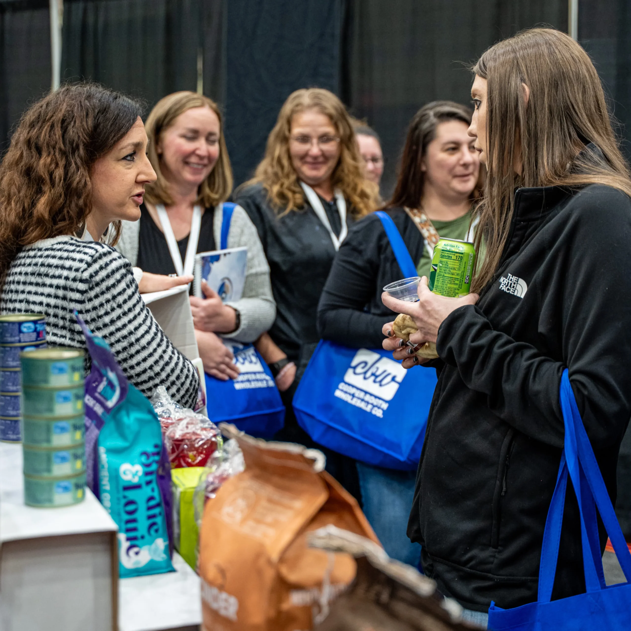 Customers Talk at Worthy Booth